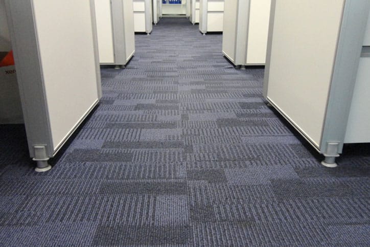 Close up of commercial office carpet tile flooring.